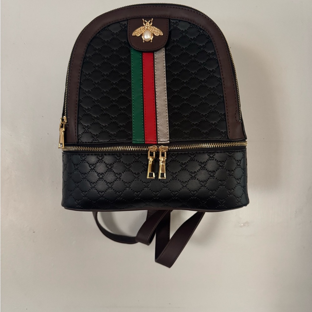 NWT Black Backpack with Gold Bee Accent and wallet .